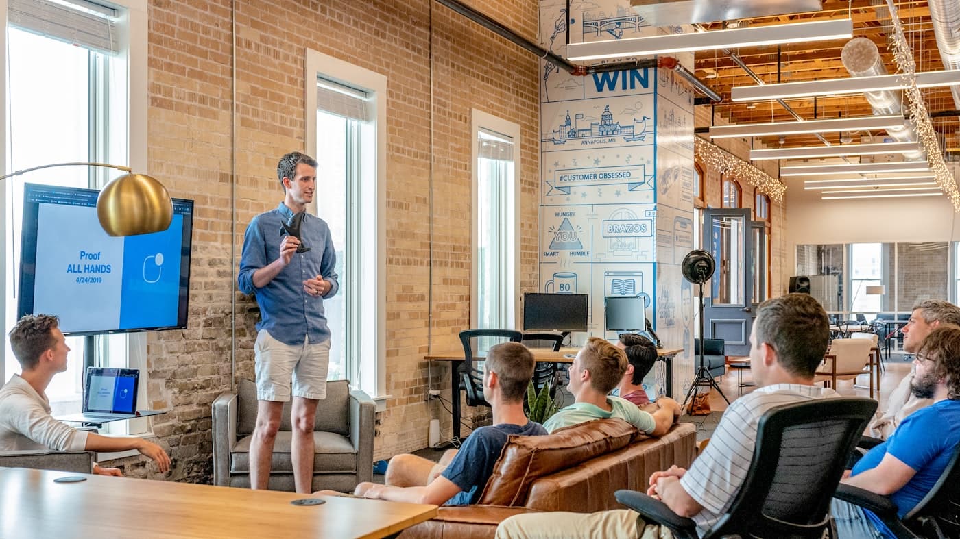 A leader presenting to a focused executive group.