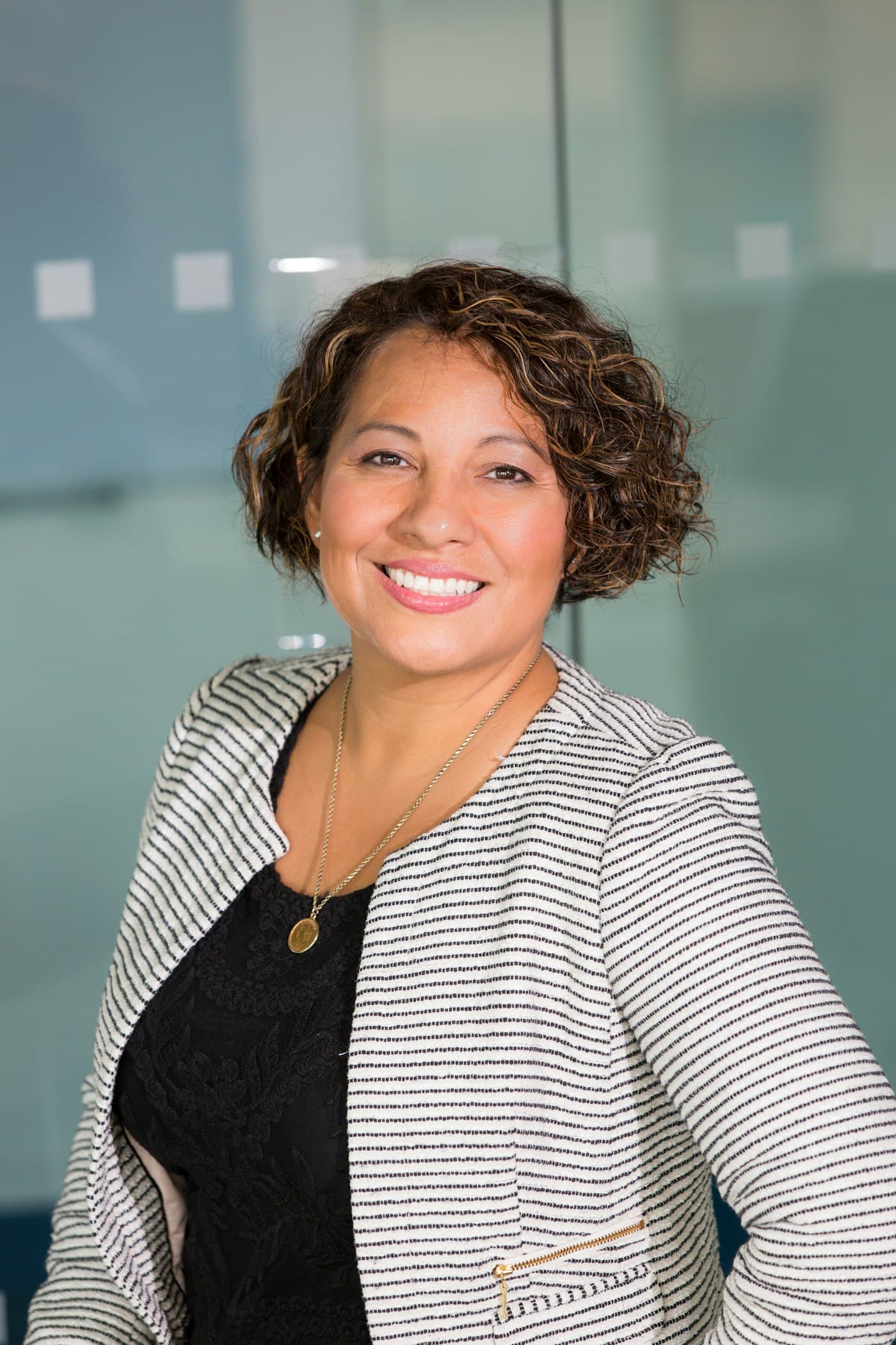 Professional portrait in an office setting.